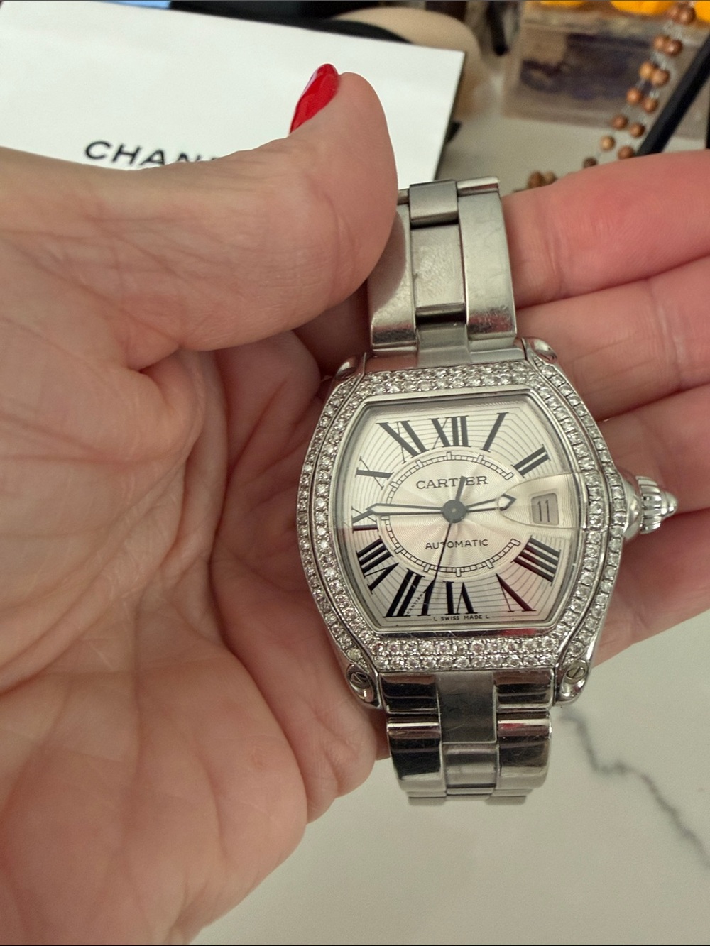 Cartier Roadster with diamond bezel. Stainless steel 
White face.